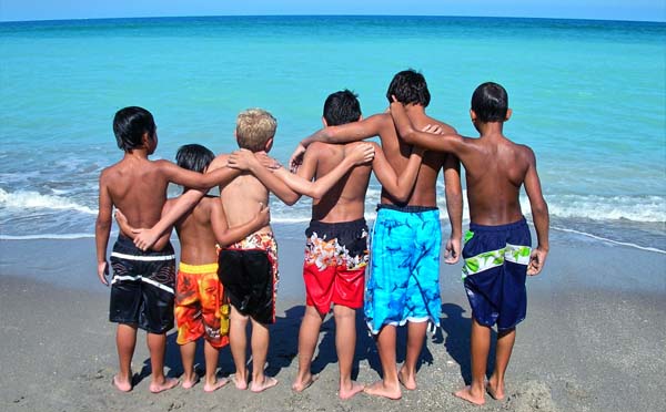 Groups of boys at the beach